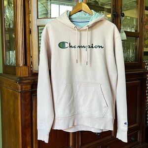 Men’s peachy mauve pink colored Champion hoodie